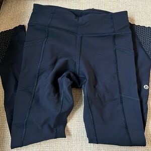 navy leggings with ankle detail